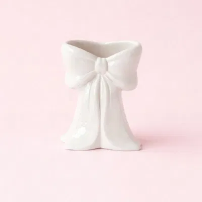 Khay đựng dạng nơ có đáy