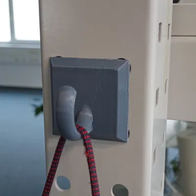 Móc treo áo & giữ dây cáp cắm vào bàn công nghiệp (Manuflex)