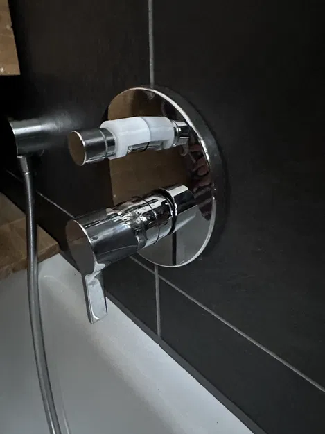 Khóa vòi bồn tắm Hansgrohe – Ngăn gạt tự về miệng vòi - Image 1