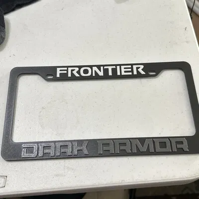 Ốp che biển số Nissan Frontier Dark Armor