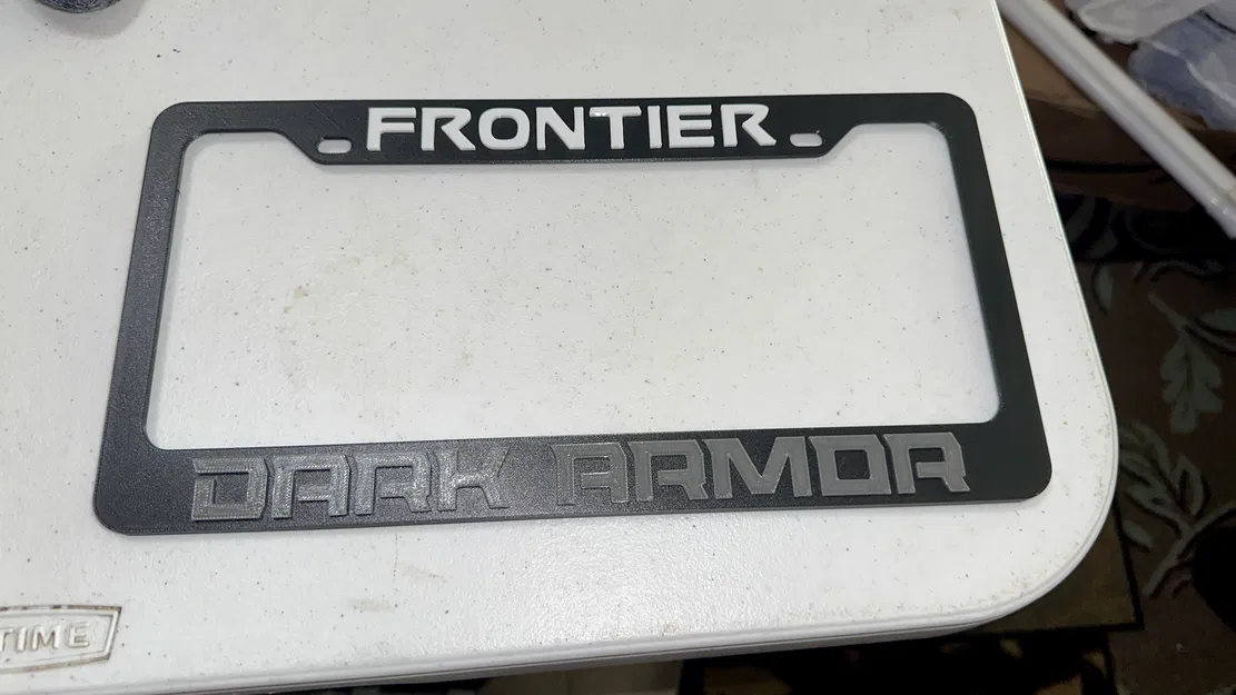 Ốp che biển số Nissan Frontier Dark Armor - Image 2