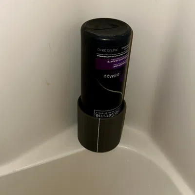 Giá đỡ chai dầu gội tròn (Round Shampoo Bottle Holder)