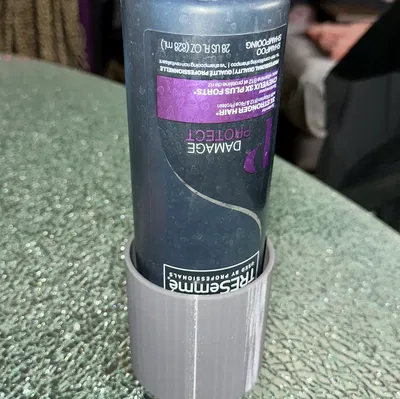 Giá đỡ chai dầu gội tròn (Round Shampoo Bottle Holder)