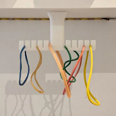 Móc treo dây thun The Rubber Band Hanging Thing (Gummiring-Aufhängding)