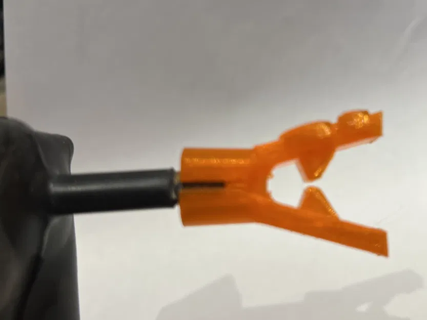 DeflatoClip(TM) – dụng cụ xả hơi ruột xe đạp cho van Schrader - Image 1