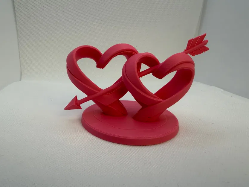 Tượng Hai Trái Tim Đan Xen Xuyên Mũi Tên - Image 1