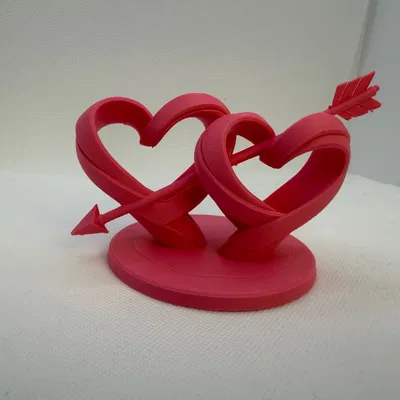 Tượng Hai Trái Tim Đan Xen Xuyên Mũi Tên