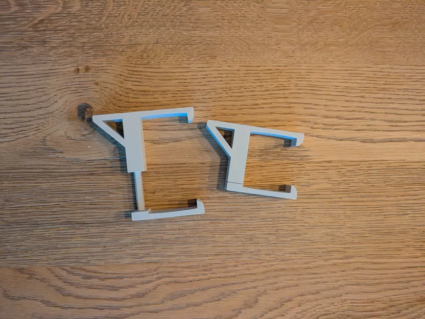 Ngàm giữ ổ cắm điện (powerstrip) điều chỉnh được - Image 2