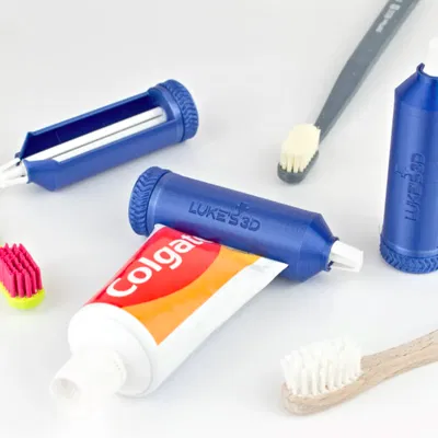 Dụng cụ bóp tuýp kem đánh răng kiểu ratchet