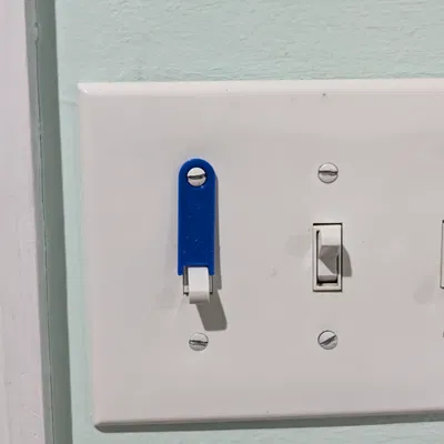 Khóa/ốp chặn công tắc đèn toggle – đơn giản, dễ, nhanh