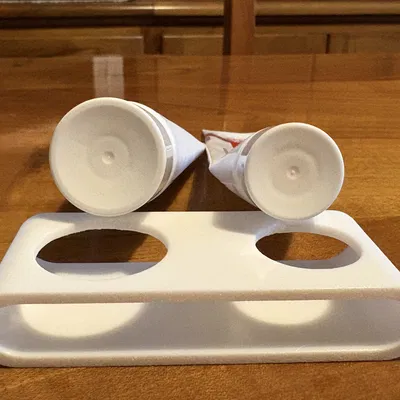 Porta dentifricio (Giá đỡ kem đánh răng)