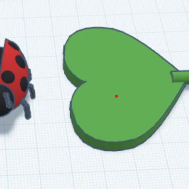 Bọ rùa dễ thương và lá hình trái tim