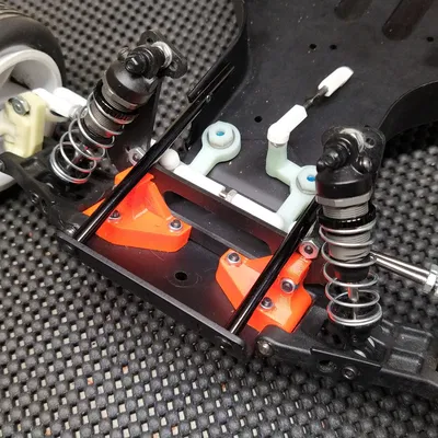 NIX62084 - Ngàm gắn tay trước RC10 (front arm mount)