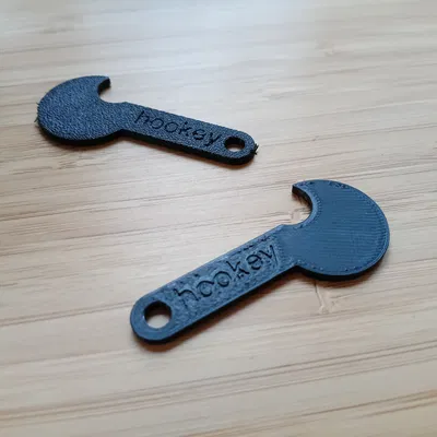 Hookey – Chìa mở khóa xe đẩy 2€