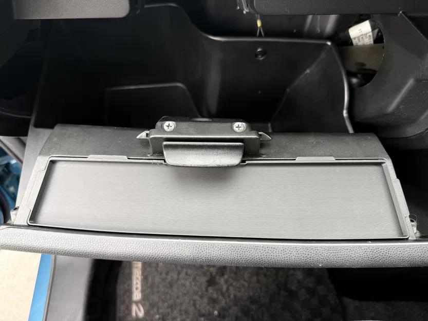 Tấm che hộc đồ Mazda2 DE 2007–2014 (glovebox cover plate) - Image 1