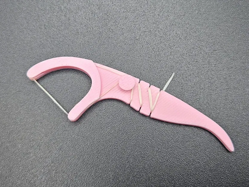 Que Chỉ Nha Khoa Tái Sử Dụng (Reusable Floss Stick) - Image 1