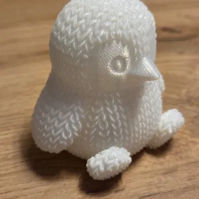 Chim cánh cụt đan len (Knitted penguin)