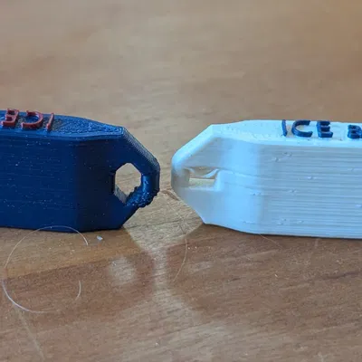 Còi V2: lỗ treo/làm keyring dễ in hơn + chữ (ICE alert)