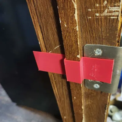 Chặn lẫy cửa để giữ cửa không khóa (Door latch hold-open / Interrupter)