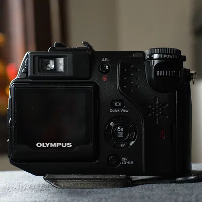 Olympus C-5050 compact arca plate