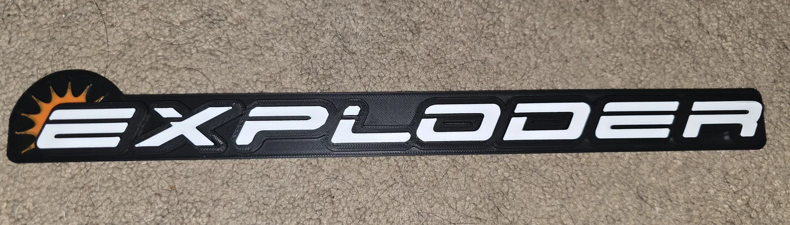 Huy hiệu “Ford Exploder” (Ford Exploder Badge) - Image 1