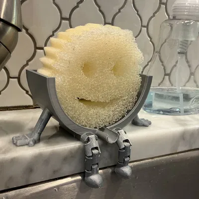 Giá để Scrub Daddy gác bồn rửa dạng khớp, có lỗ thoát nước