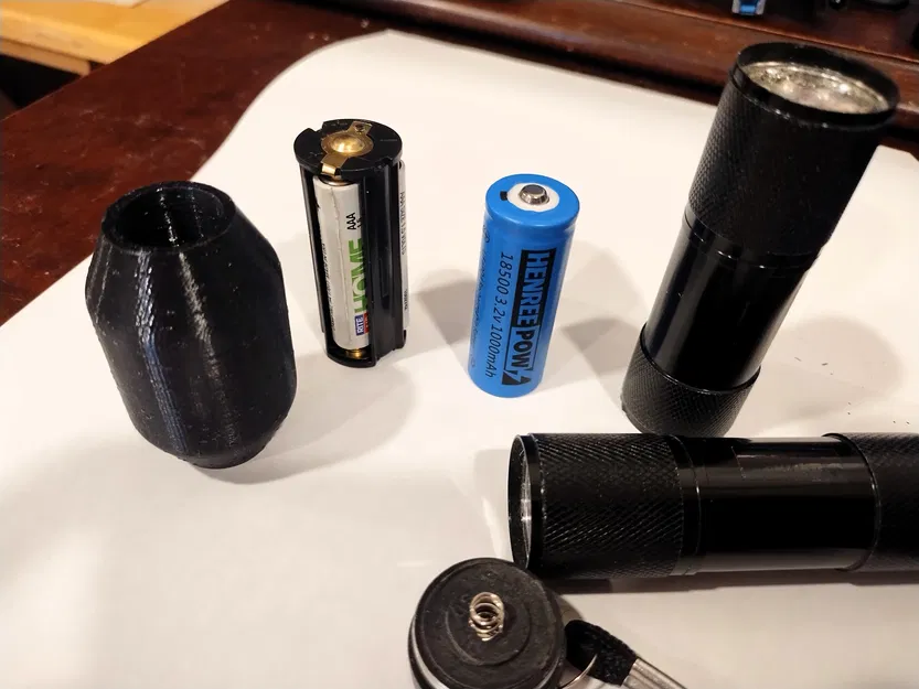 Adapter thay cartridge 3x AAA sang pin 18500 cho đèn pin LED mini - Image 1