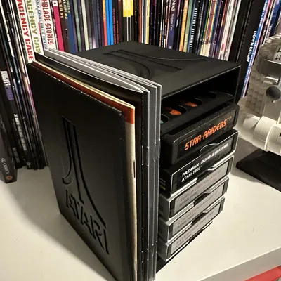 Giá đỡ cartridge & sách hướng dẫn Atari 2600 và 7800