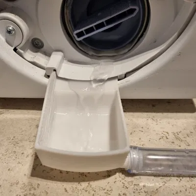 Cốc xả bơm máy giặt Bosch kèm đầu nối ống