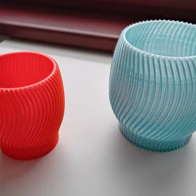 Chậu hoa xoắn ốc kèm dĩa hứng nước ẩn (hidden/invisible saucer)