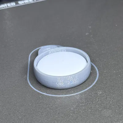 PermaTag – Vỏ AirTag chống cạy phá, niêm kín ngay lúc in (không ốc)