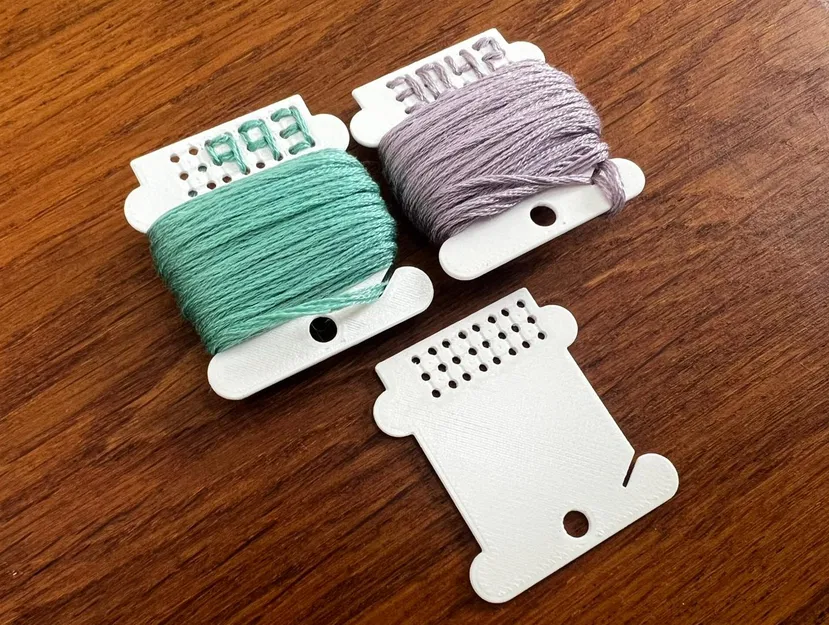 Suốt chỉ thêu có thêu số mã màu - Image 1