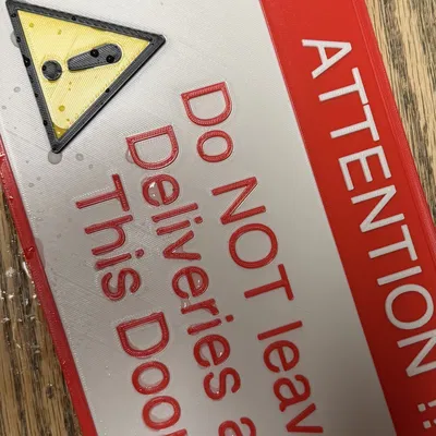 Bảng: KHÔNG ĐỂ HÀNG GIAO Ở CỬA NÀY