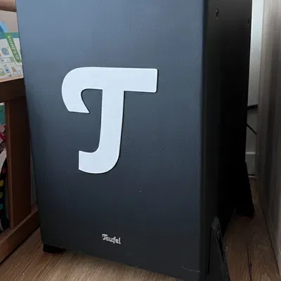 Logo chữ T lớn của Teufel