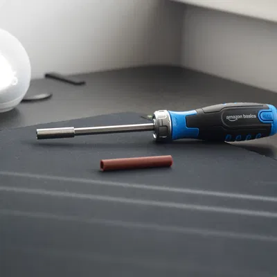 Tay cầm trục tua vít (Screwdriver shaft grip)