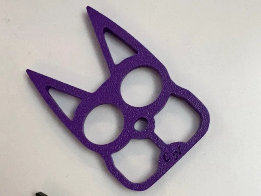 Móc khóa Cat Eyes dạng two-finger brass knuckles - Image 3