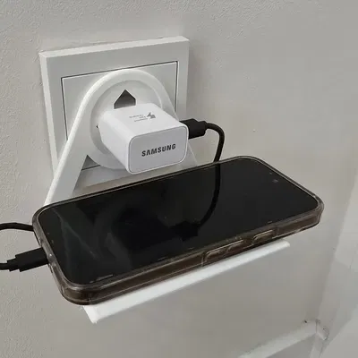 Giá đỡ điện thoại cắm vào ổ điện chuẩn châu Âu (EU/Schuko)