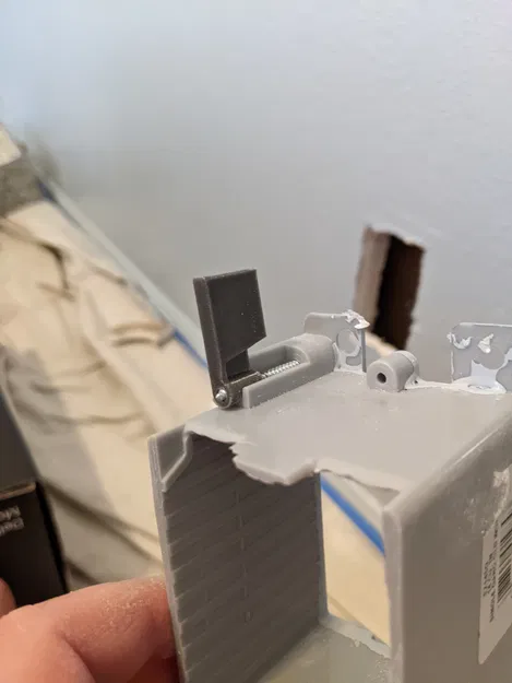 Nắp gài khóa gang box điện (Old Work) bị rơi trong tường - Image 1