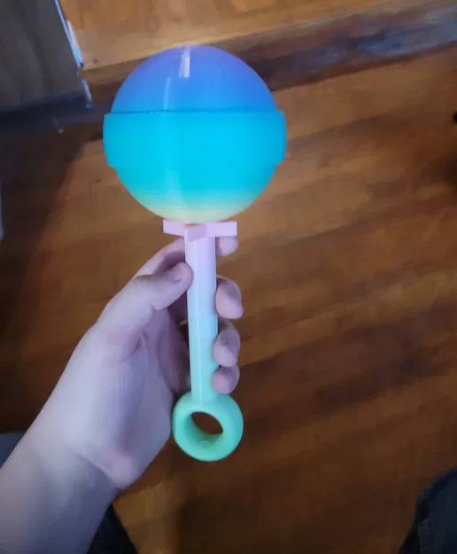Lục lạc em bé cỡ người lớn (Adult Sized Baby Rattle) - Image 1
