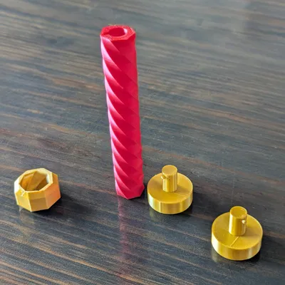 Fidget dạng ốc/vòi (screw/baton fidget)