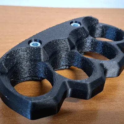 Brass knuckle siêu bền – dùng để bẻ nứt hạt (cracking nuts)!