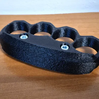 Brass knuckle siêu bền – dùng để bẻ nứt hạt (cracking nuts)!