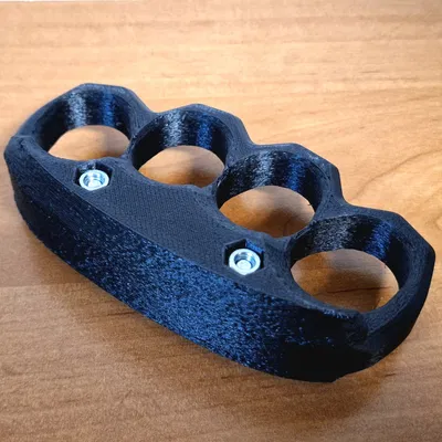 Brass knuckle siêu bền – dùng để bẻ nứt hạt (cracking nuts)!
