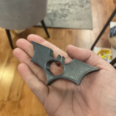 Gác ngón cái giữ sách Batman (Batman book thumb support)