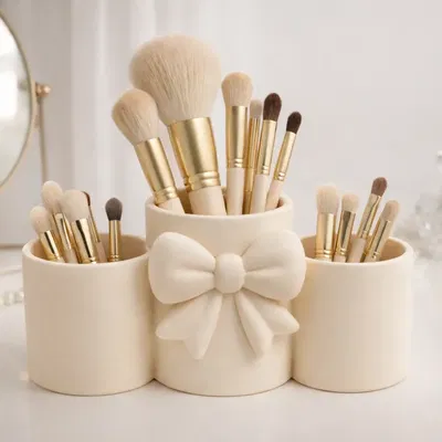 Giá đỡ cọ trang điểm hình nơ