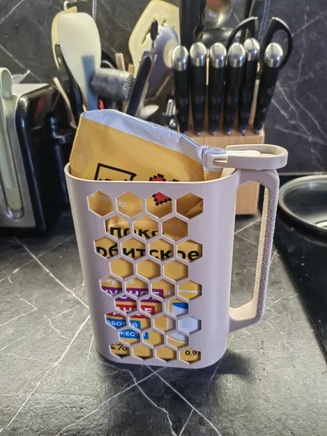 Giá đỡ bịch sữa/nước ép 1L PET kèm clip - Image 1