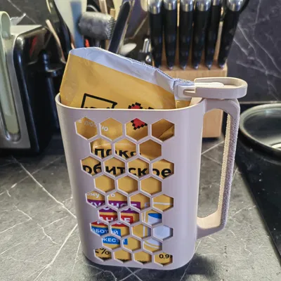 Giá đỡ bịch sữa/nước ép 1L PET kèm clip