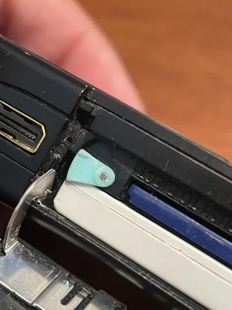 Lẫy giữ pin Nikon Coolpix S51 (Nikon Coolpix s51 Battery Latch) - Image 1