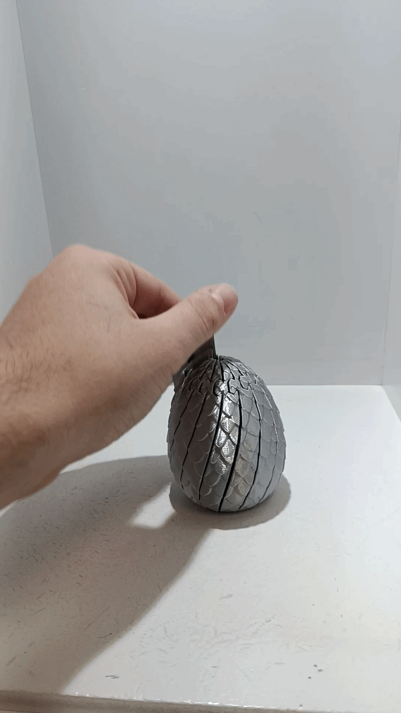 Trứng Rồng Twist Fidget - Thumbnail 1