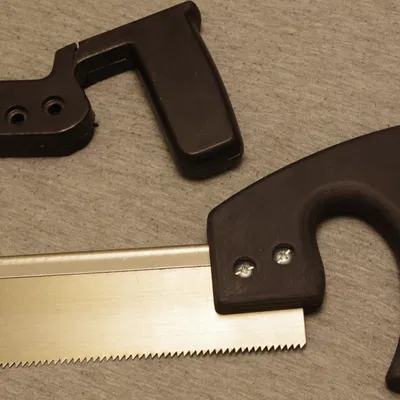 Tay cầm cưa sắt